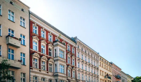 A stunning view of historic residential buildings in Berlin, Germany, showcasing classical architecture on a clear day.
