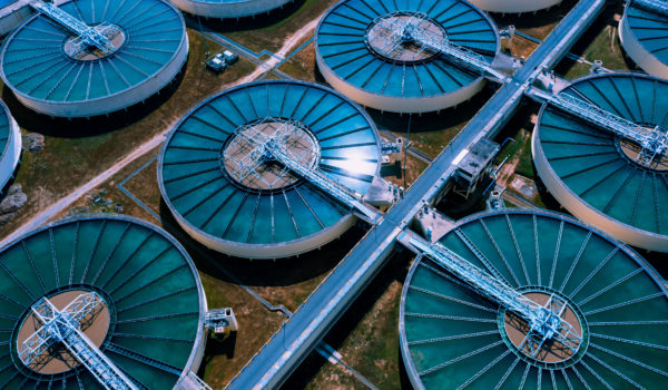 Aerial View of Drinking water treatment plant. Microbiology of drinking water production and distribution, water treatment plant. Microbiology of drinking water production. Morning scene.