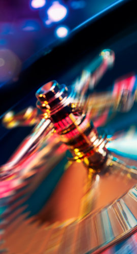 high contrast image of casino roulette in motion