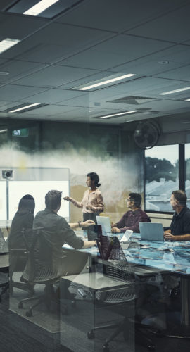 Shot of a businesswoman giving a presentation to her colleagues in an office