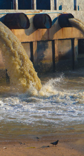 Industrial and factory waste water discharge pipe into the canal and sea.