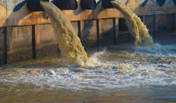 Industrial and factory waste water discharge pipe into the canal and sea.