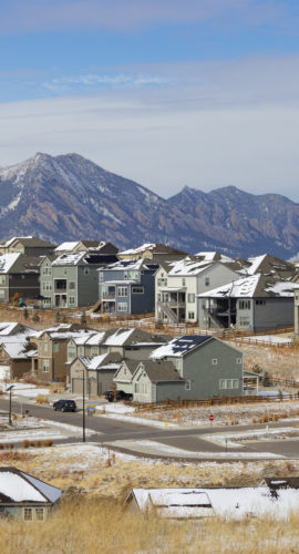New housing development in Colorado with the Flatiron Mountains in the background.