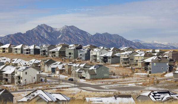 New housing development in Colorado with the Flatiron Mountains in the background.